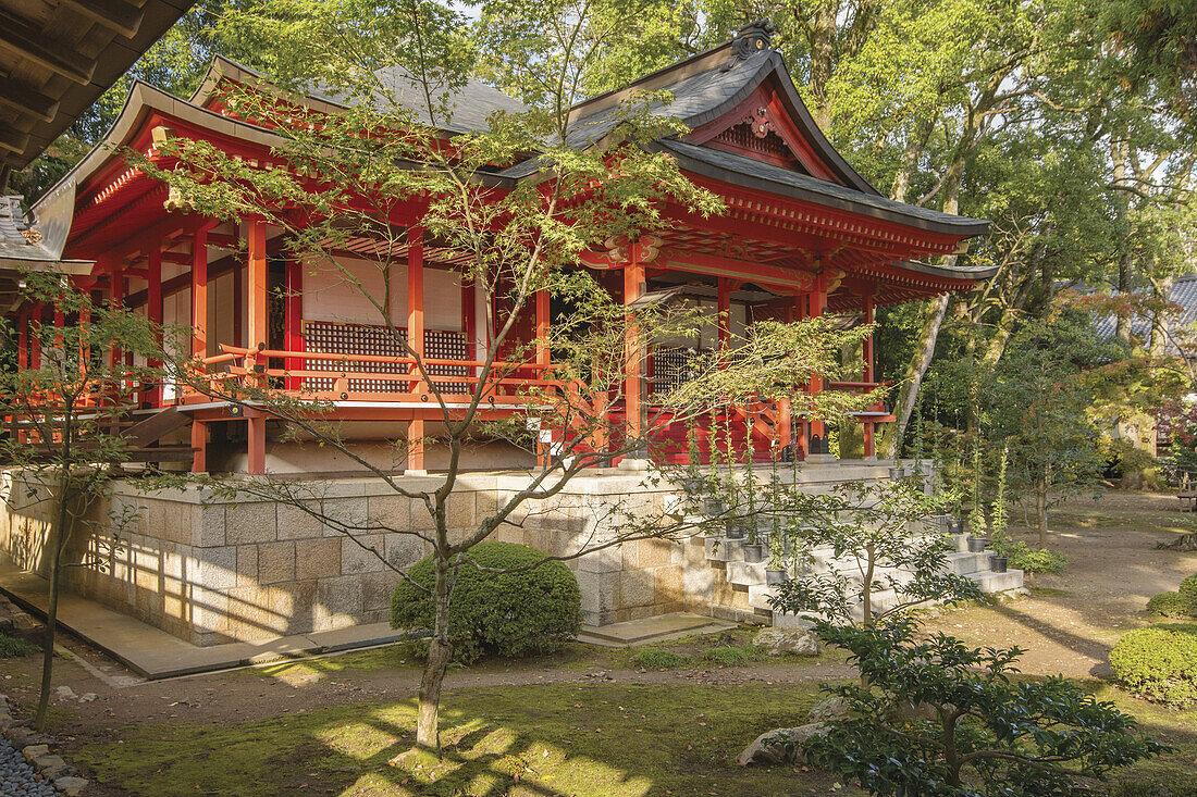 Red Japanese Temple Building And Garden; Arashiyama, Kyoto, Japan