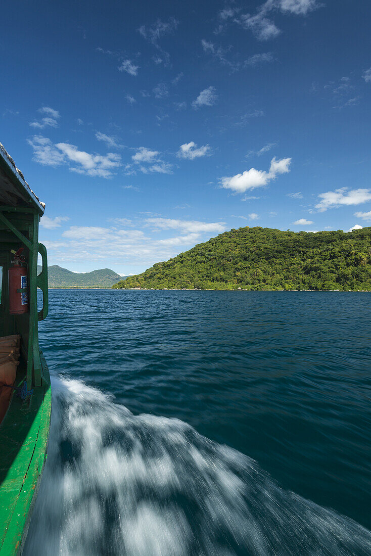 Small Boat Going Past Island Off Cape Maclear, Lake Malawi; Malawi