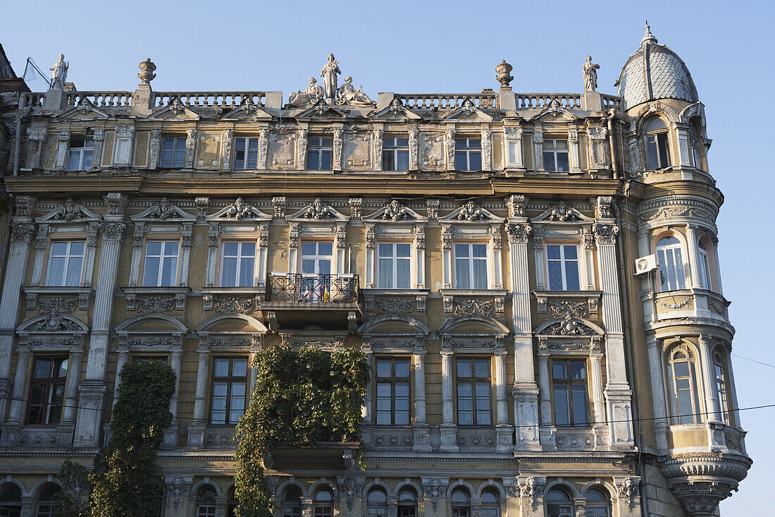 Crumbling Facade Ornately Decorated Neoclassical Apartment Building In The Historical City Centre; Odessa, Ukraine