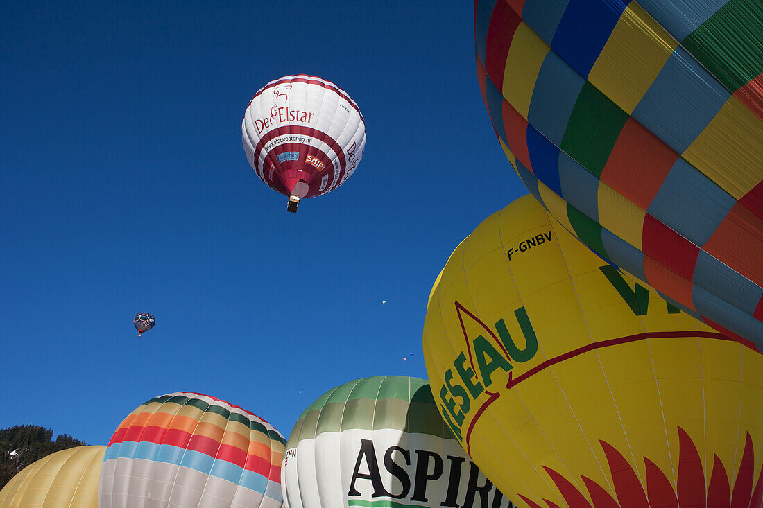 Hot Air Balloons Readying For Lift-Off During The Ski Resort's Annual Hot Air Balloon Festival; Filzmoos, Austria