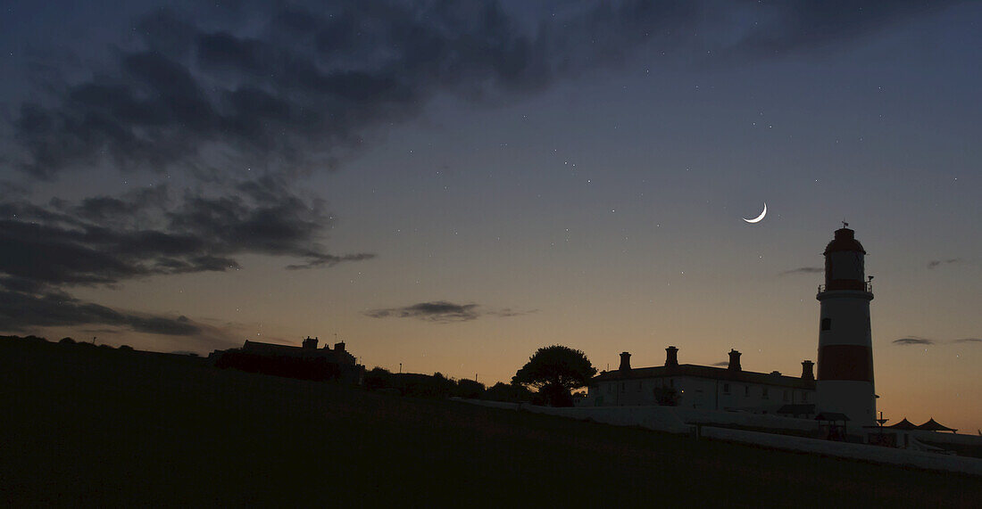 Silhouette Of Lighthouse At Dusk; South Shields, Tyne And Wear, England