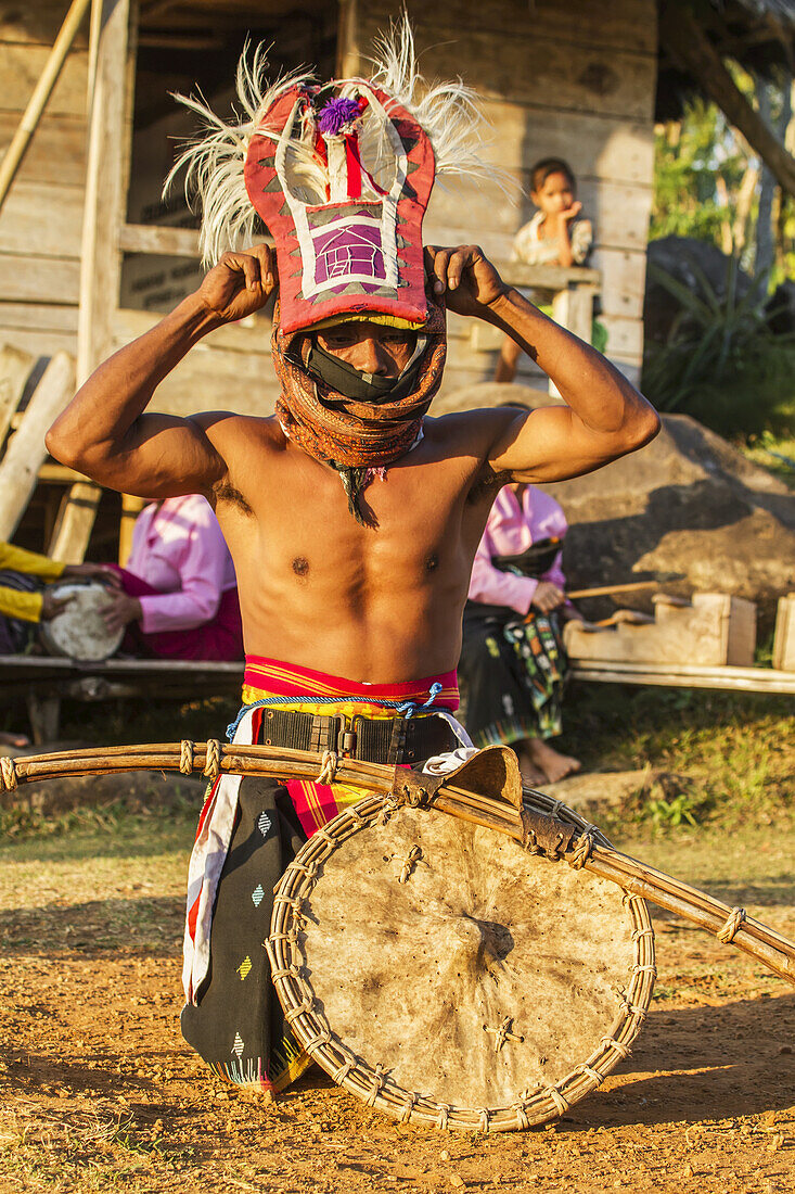 Manggarai Man Wearing A Traditional Headdress Wrapped With Cloth Wielding A Shield And Bamboo Whip In A Caci, A Ritual Whip Fight, Melo Village, Flores, East Nusa Tenggara, Indonesia
