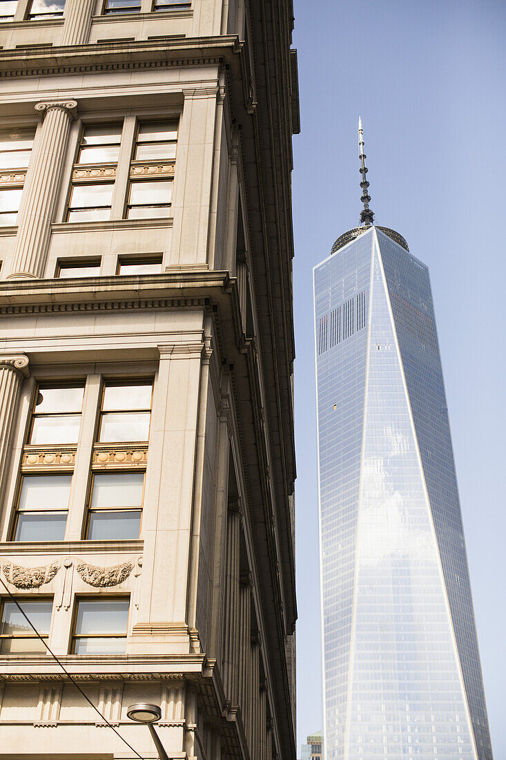 World Trade Centre Tower Behind Older Building; New York City, New York, United States Of America