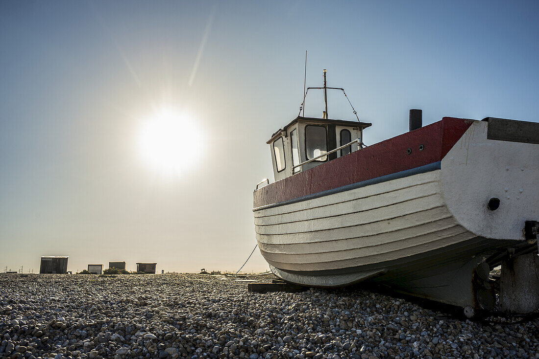 A Boat On A Shingle Beach; Dungeness, Kent, England