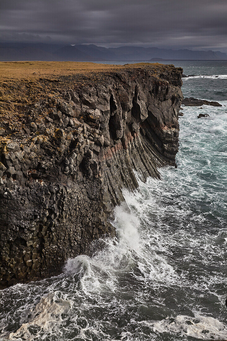 Lava cliffs along the seashore at Arnastapi, Snaefellsnes, western Iceland; Iceland