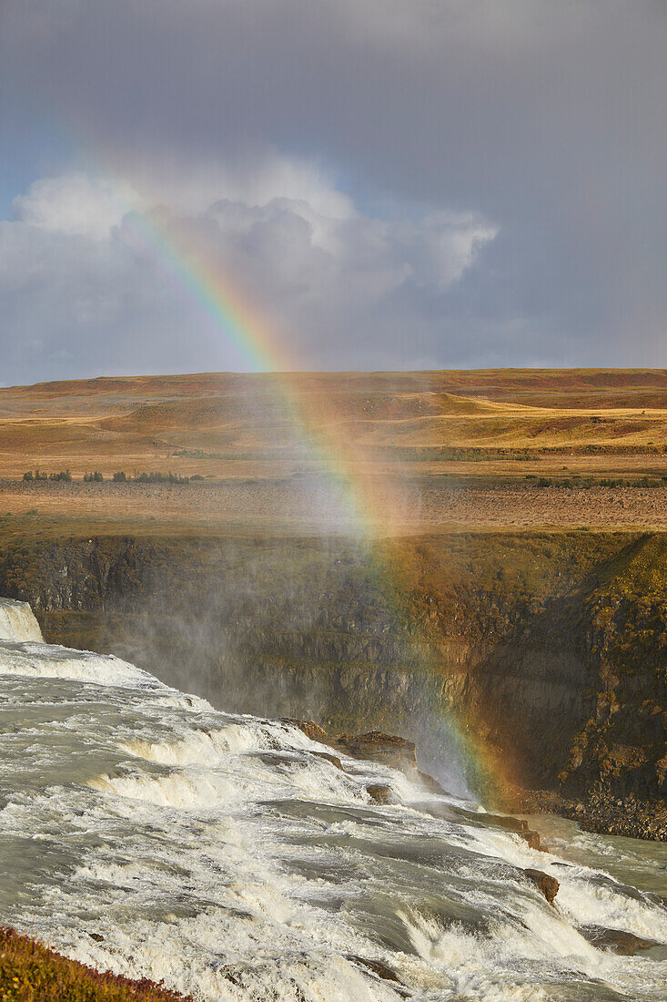 Rainbow in the mist over Gullfoss Falls in the Golden Circle of Iceland; Iceland