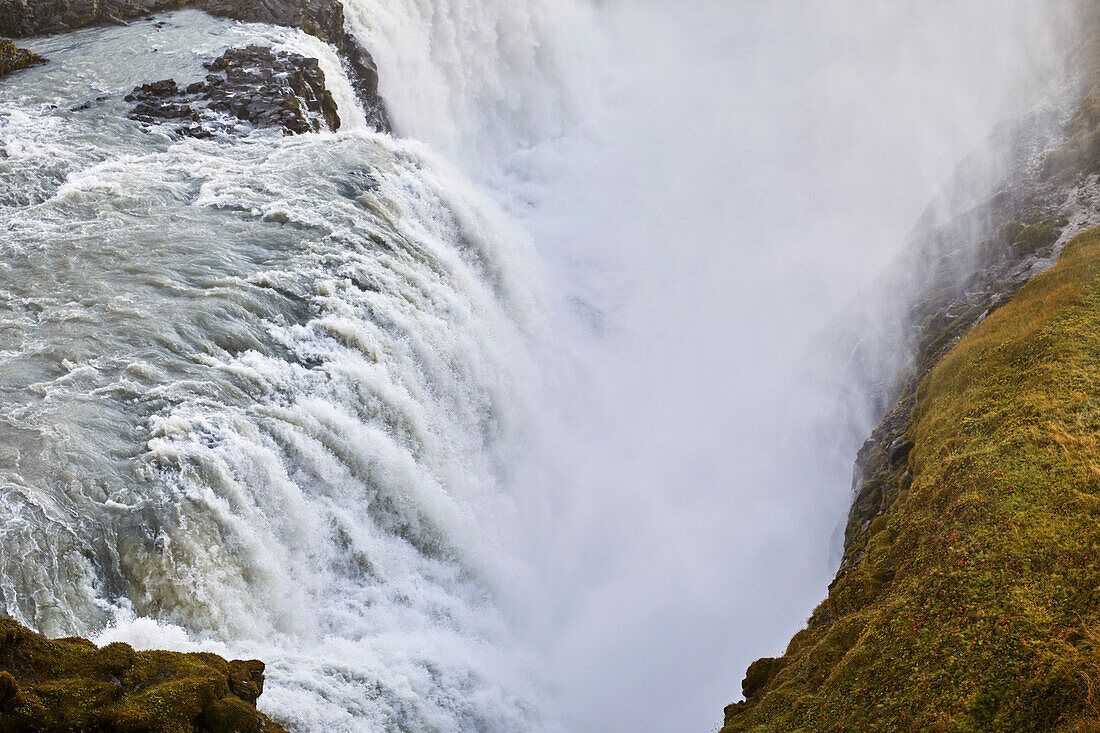 Splashes and mist over Gullfoss Falls in the Golden Circle of Iceland; Iceland