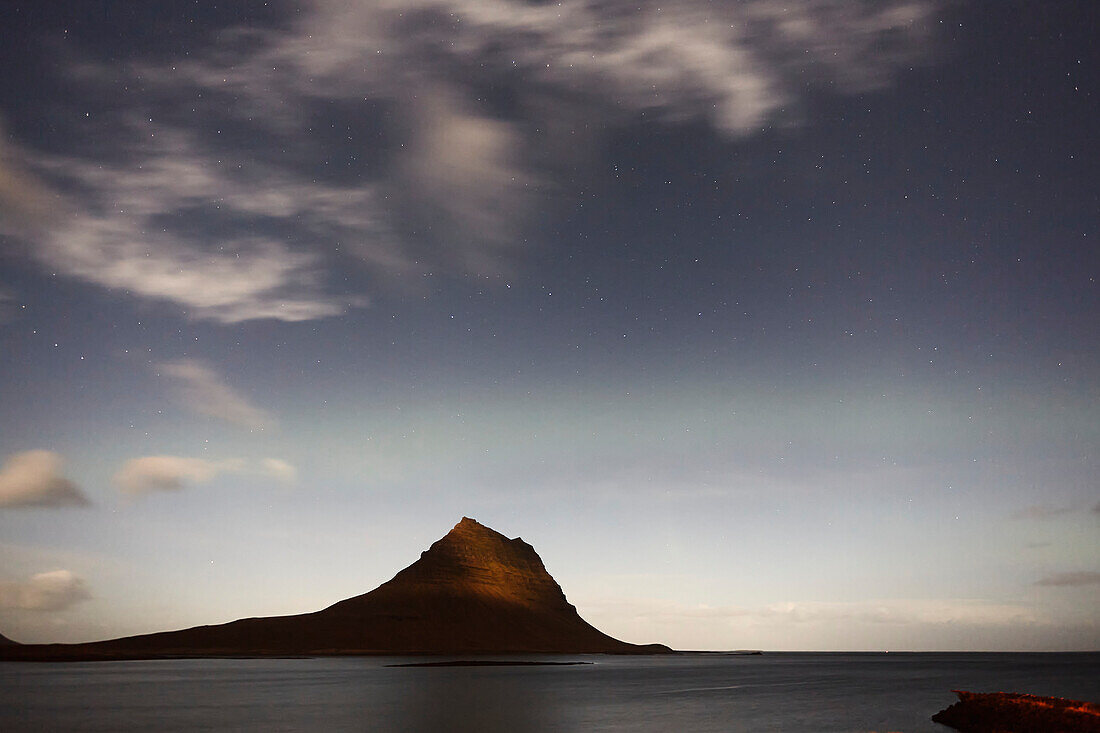 Night sky over Kirkjurfell mountain, Grundarfjordur, Snaefellsnes peninsula, west coast of Iceland; Iceland