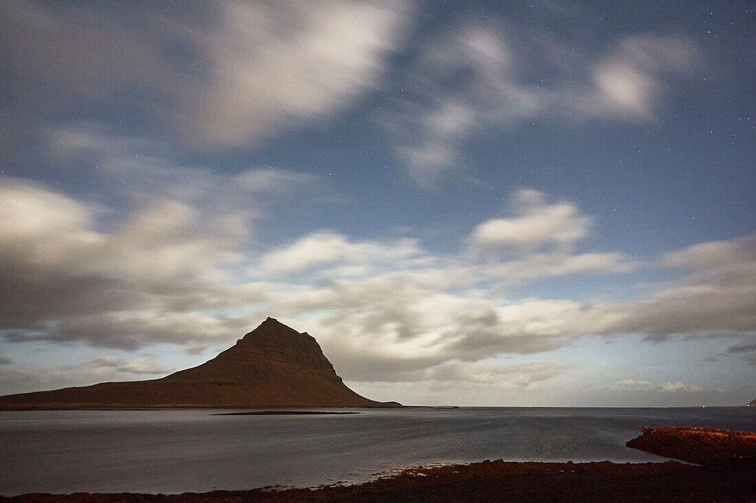 Night sky over Kirkjurfell mountain, Grundarfjordur, Snaefellsnes peninsula, west coast of Iceland; Iceland