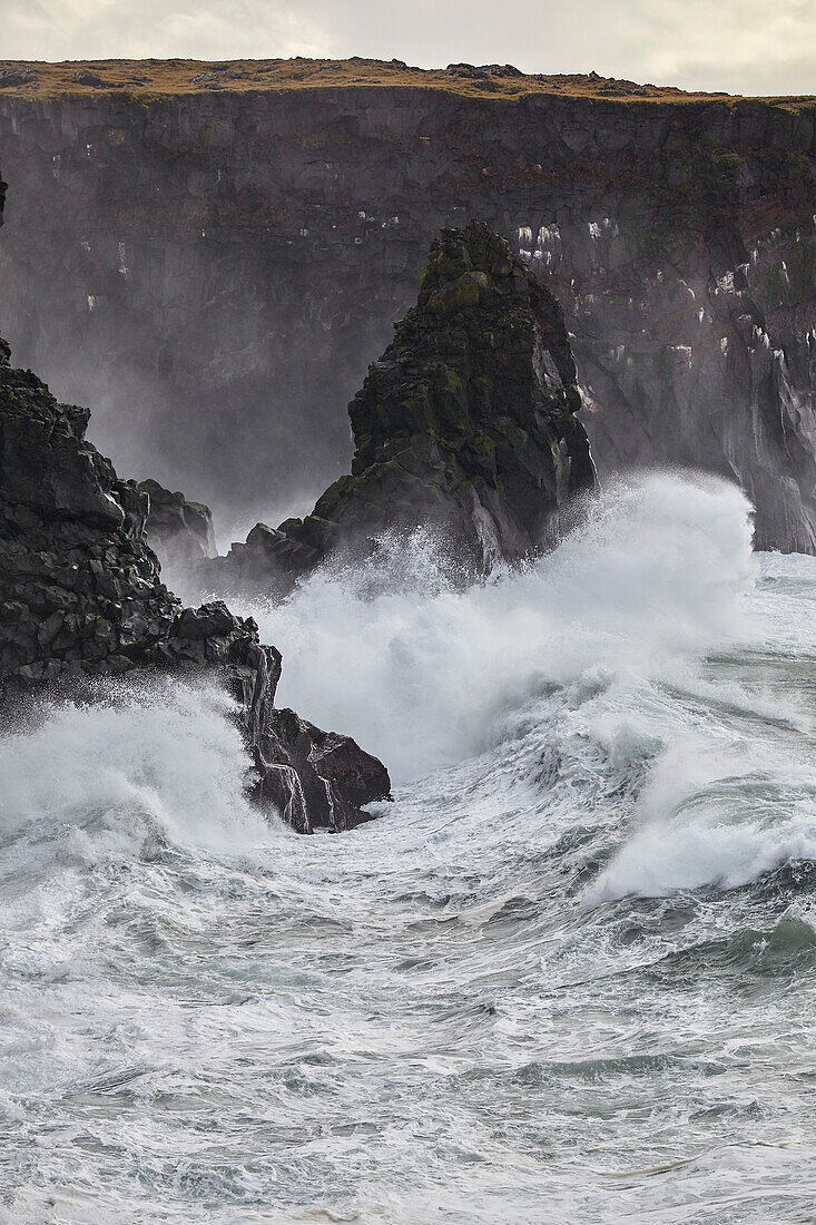 Surf on cliffs at Skalasnagi, Snaefellsnes peninsula, west coast of Iceland; Iceland