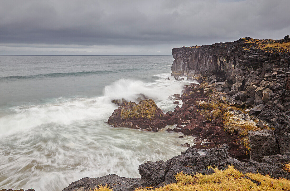 Surf on cliffs at Skardavik, at the northwestern end of the Snaefellsnes peninsula, western Iceland; Iceland