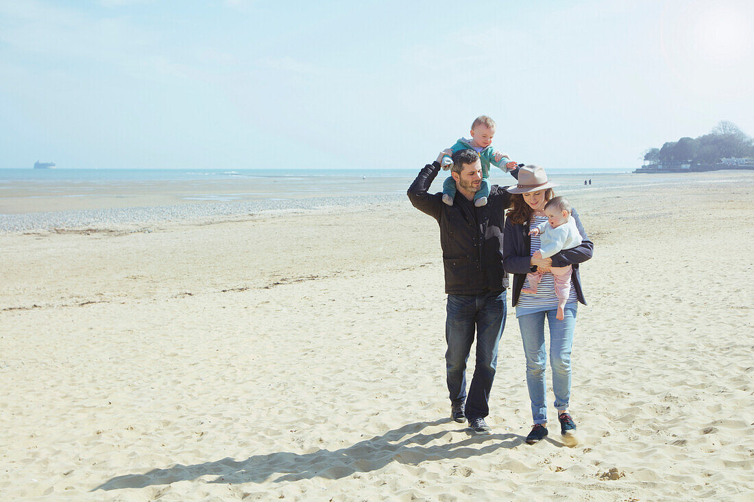 Family Walking on Beach