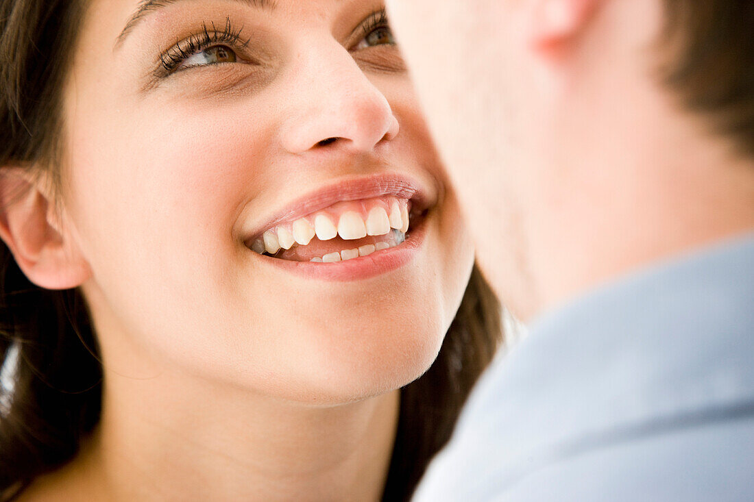 Smiling Woman Looking at Man