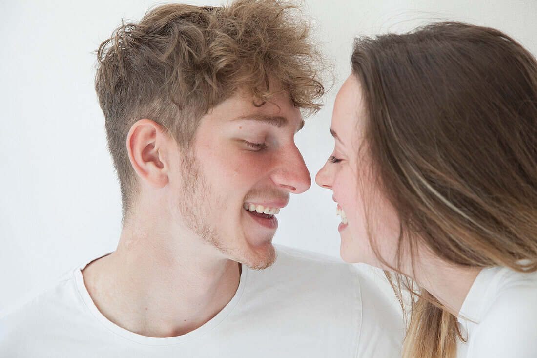 Young Couple Looking at each other Smiling