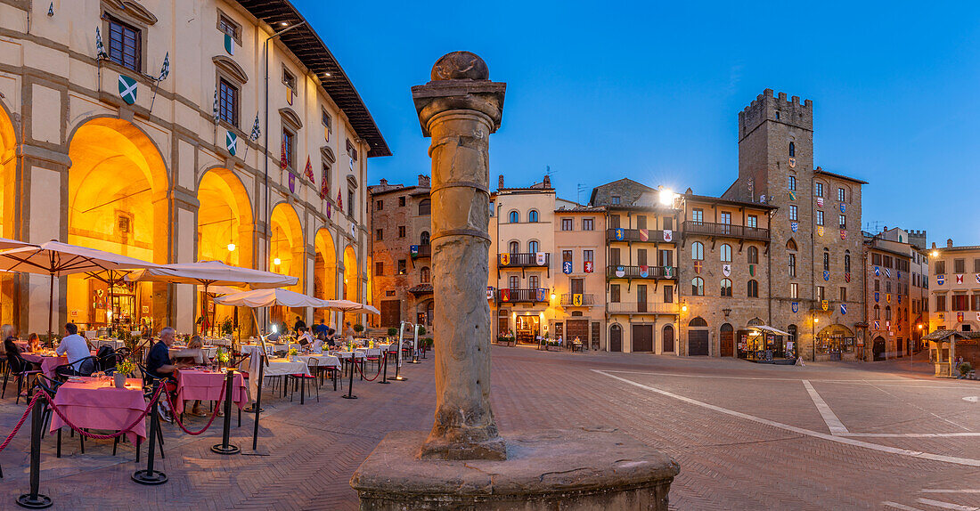 View of architecture in Piazza Grande at dusk, Arezzo, Province of Arezzo, Tuscany, Italy, Europe