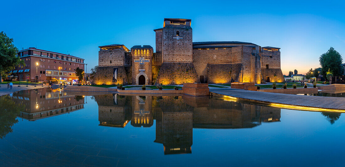 View of Castel Sismondo reflecting in ornamental water in Rimini at dusk, Rimini, Emilia-Romagna, Italy, Europe