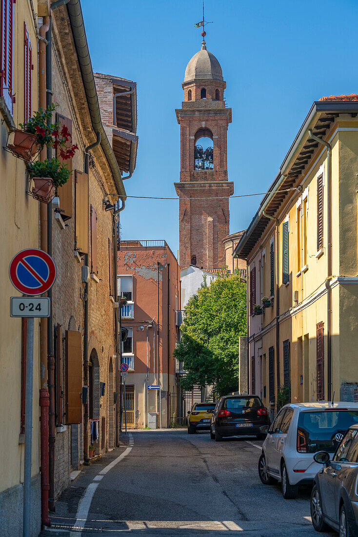 View of church bell tower and narrow street in Rimini, Rimini, Emilia-Romagna, Italy, Europe