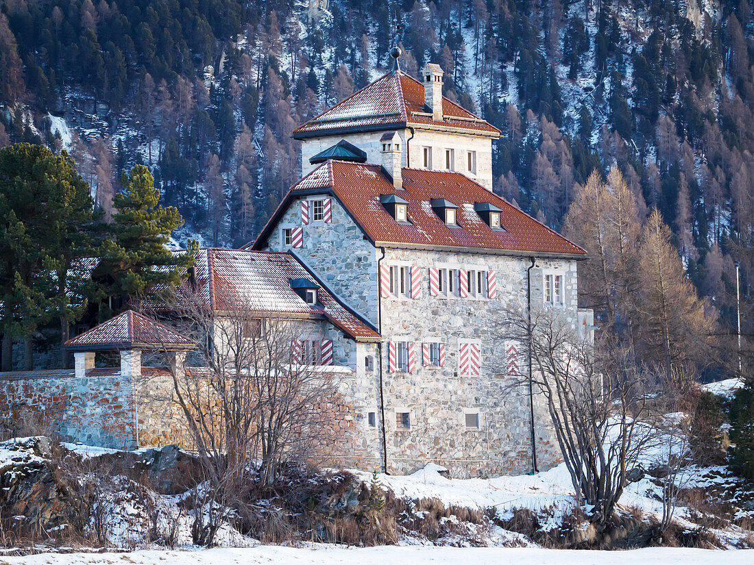 A castle-like early 20th-century house by Lake Silvaplana, Switzerland, Europe