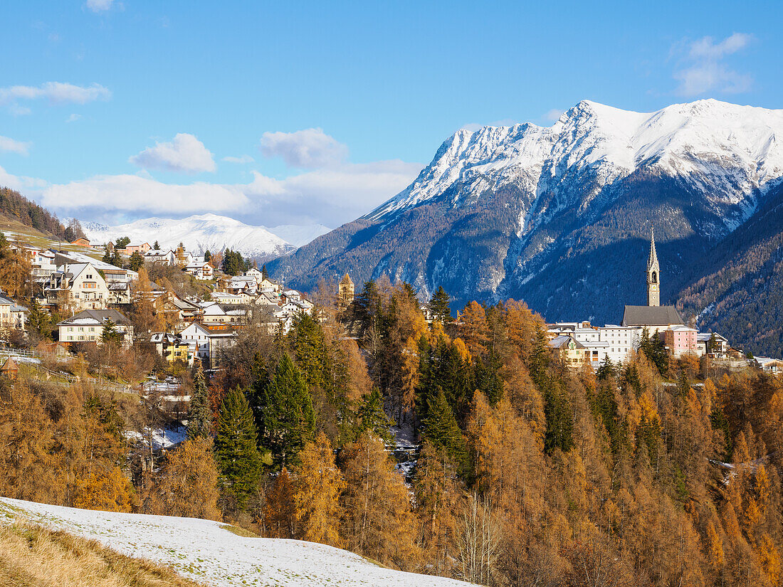 The village of Sent and autumn color in the Lower Engadine Valley, Sent, Graubunden, Switzerland, Europe