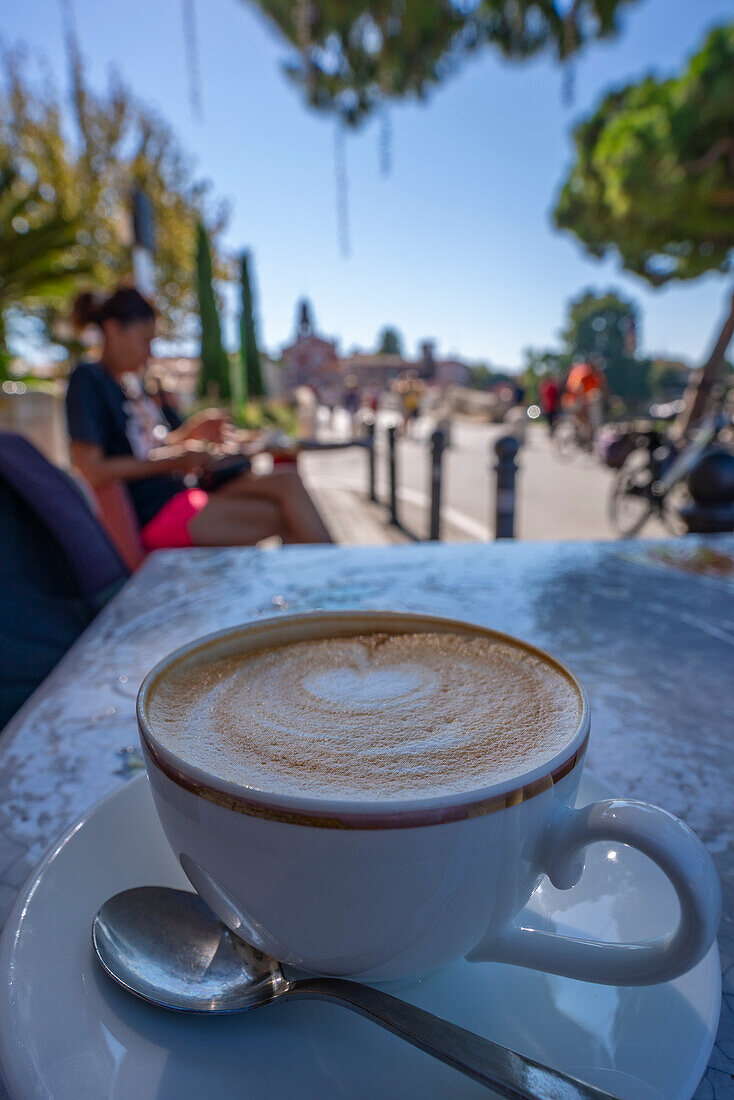 View of coffee at cafe in Borgo San Giuliano district in Rimini, Rimini, Emilia-Romagna, Italy, Europe