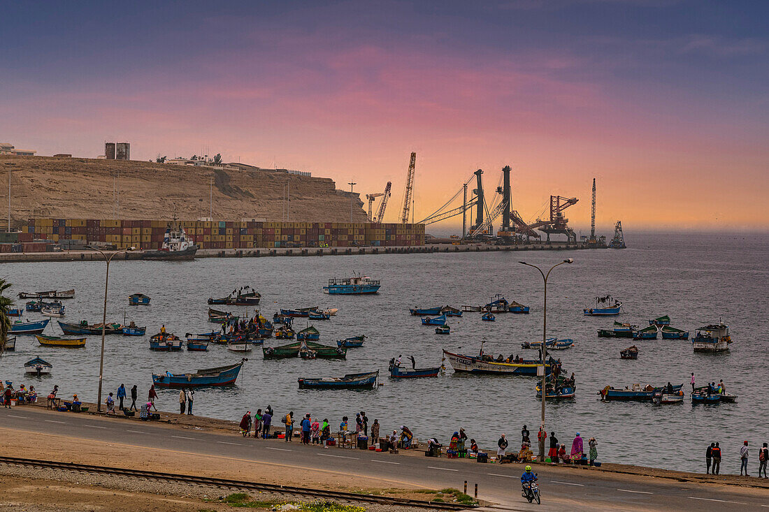 Blue hour over the harbour in the town of Namibe, Angola, Africa