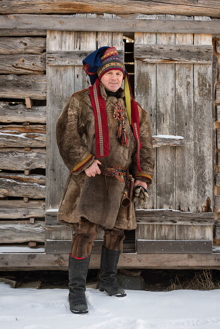 Sami man in traditional dress, Finland, Europe