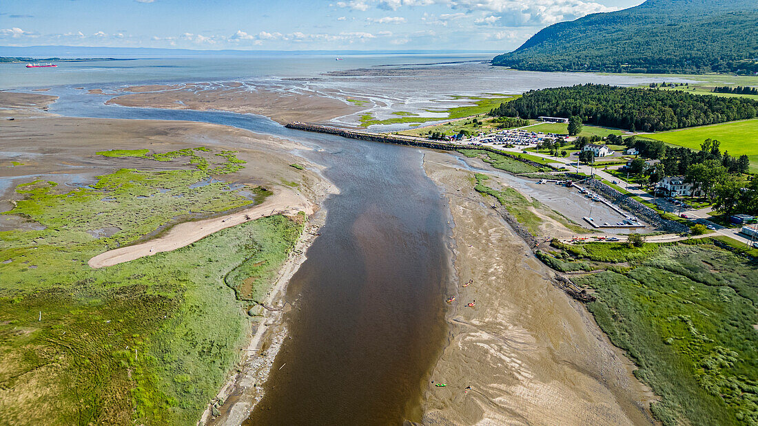 Aerial of the Gouffre River flowing in the St. Lawrence River, Quebec, Canada, North America