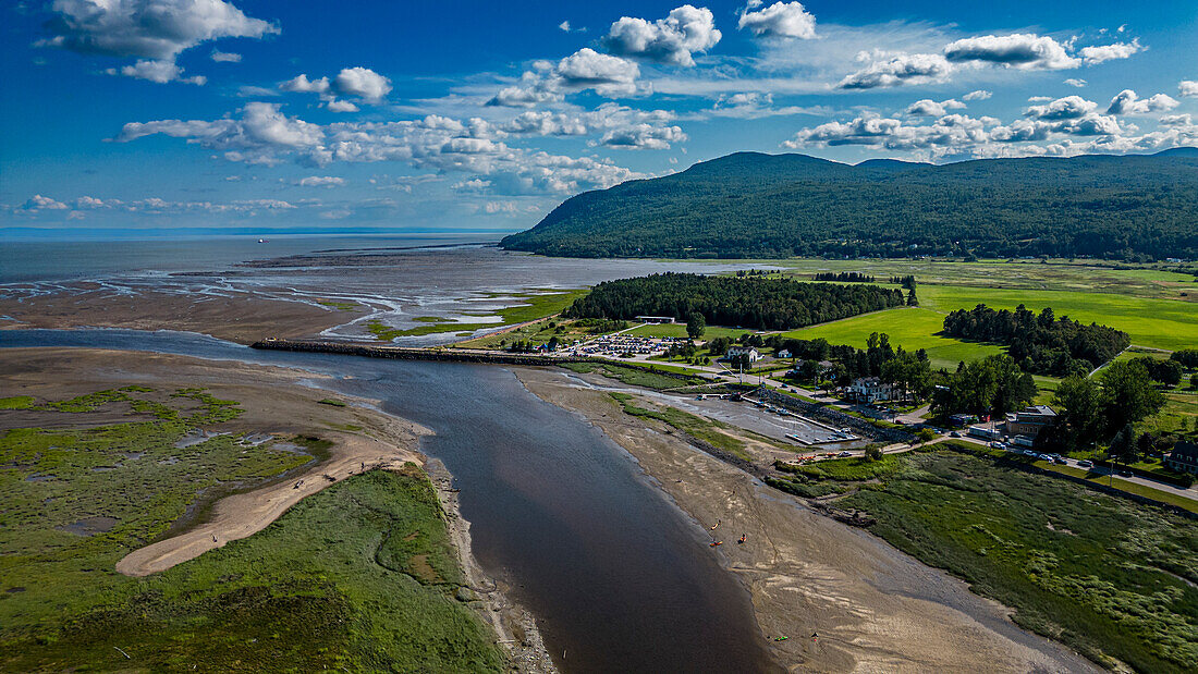 Aerial of the Gouffre River flowing in the St. Lawrence River, Quebec, Canada, North America