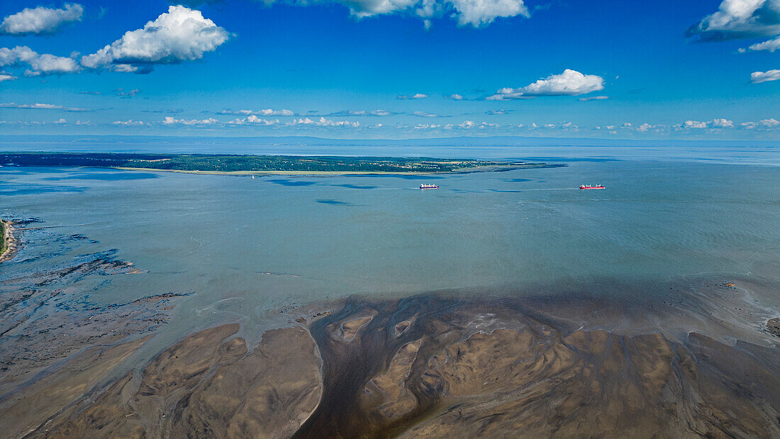 Aerial of the Gouffre River flowing in the St. Lawrence River, Quebec, Canada, North America