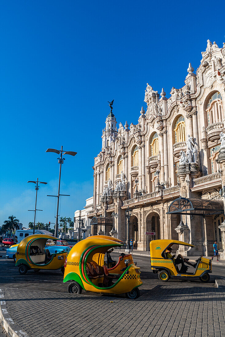 Coco taxis in front of the Theatre of Havana, Cuba, West Indies, Central America