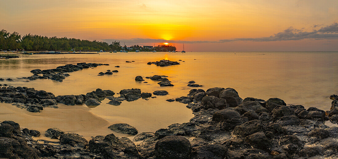 View of beach and Indian Ocean at sunset in Cap Malheureux, Mauritius, Indian Ocean, Africa