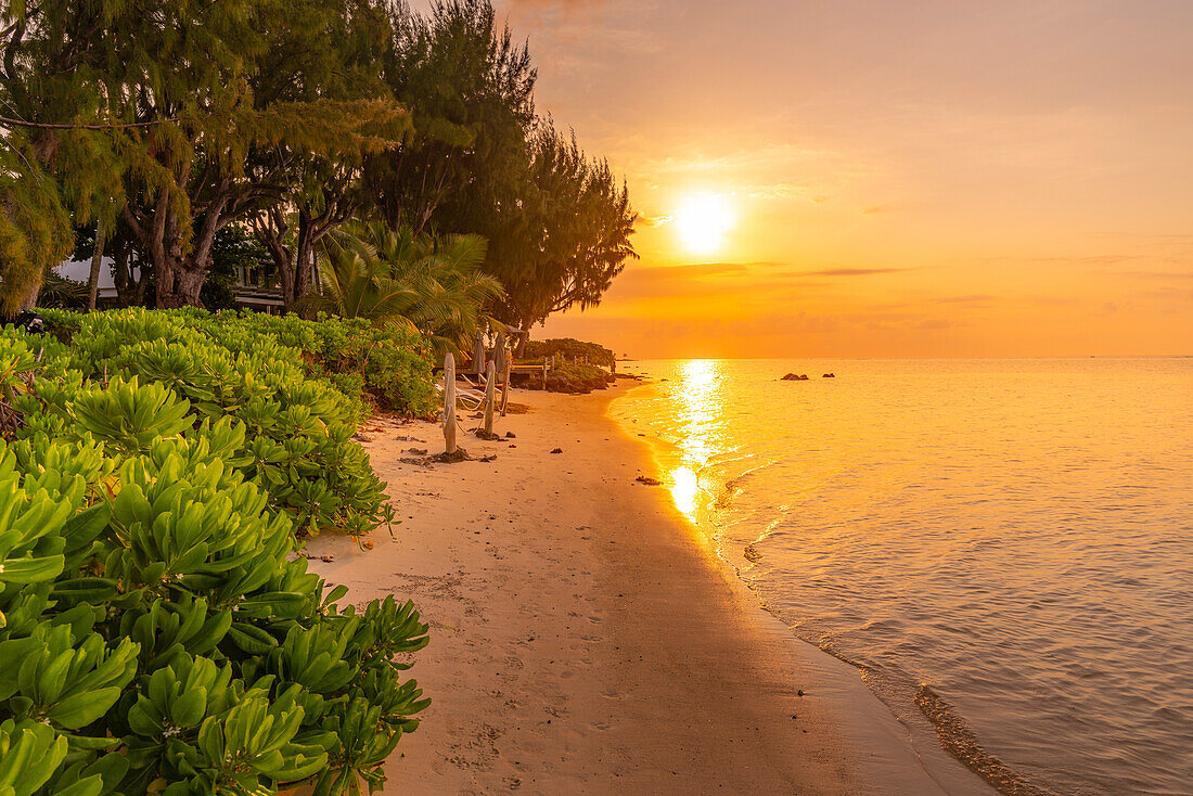 View of beach and Indian Ocean at sunset in Cap Malheureux, Mauritius, Indian Ocean, Africa