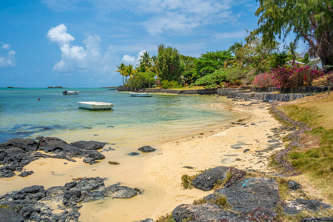 View of beach and turquoise Indian Ocean on sunny day in Cap Malheureux, Mauritius, Indian Ocean, Africa