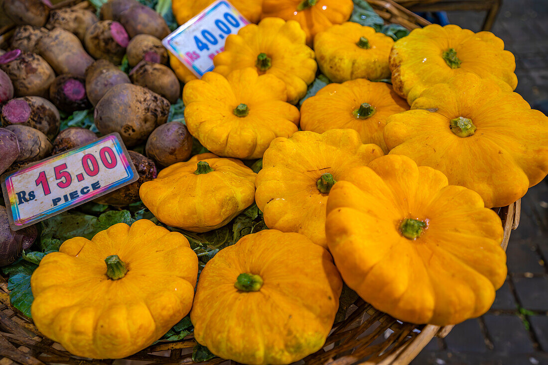 View of produce including patty pan squash on market stall in Central Market in Port Louis, Port Louis, Mauritius, Indian Ocean, Africa