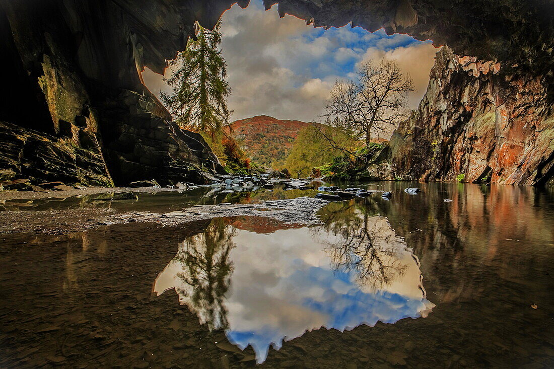 Sunshine and showers with autumn colours from Rydal Cave, Lake District National Park, UNESCO World Heritage Site, Cumbria, England, United Kingdom, Europe