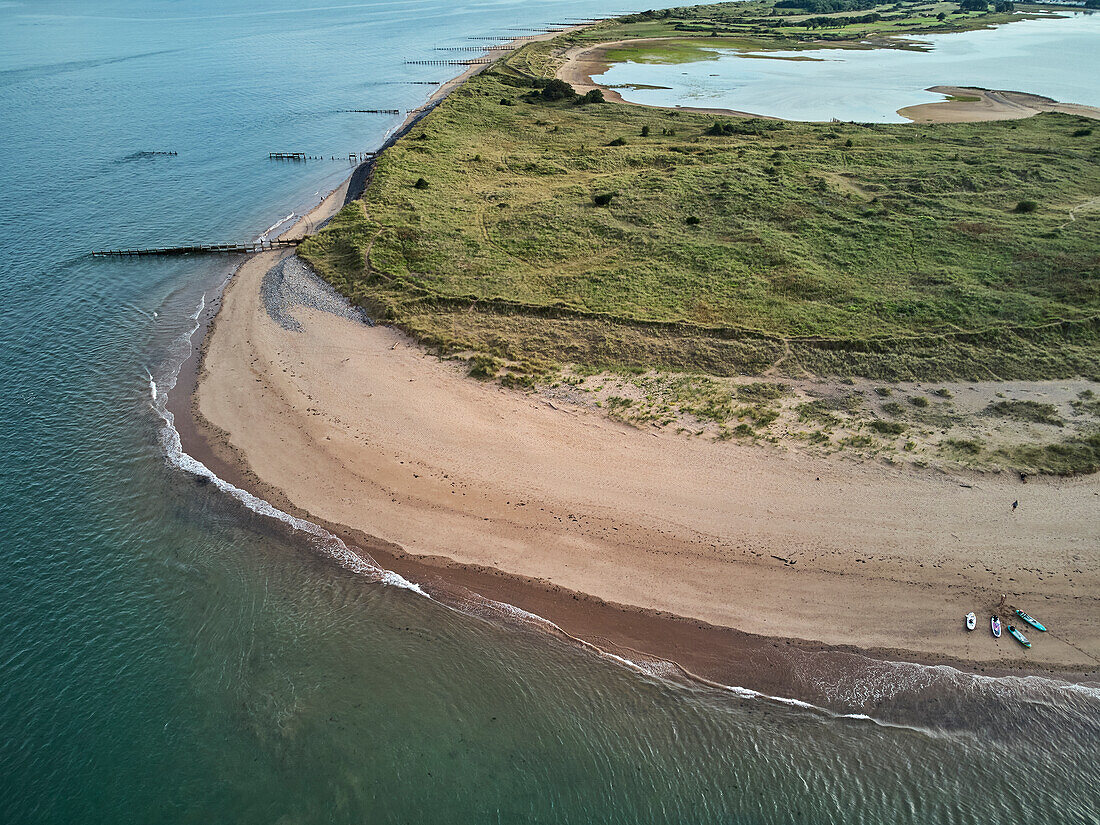 Aerial view of beach and dunes at Dawlish Warren, guarding the mouth of the River Exe, looking south along the coast towards the town of Dawlish, Devon, England, United Kingdom, Europe