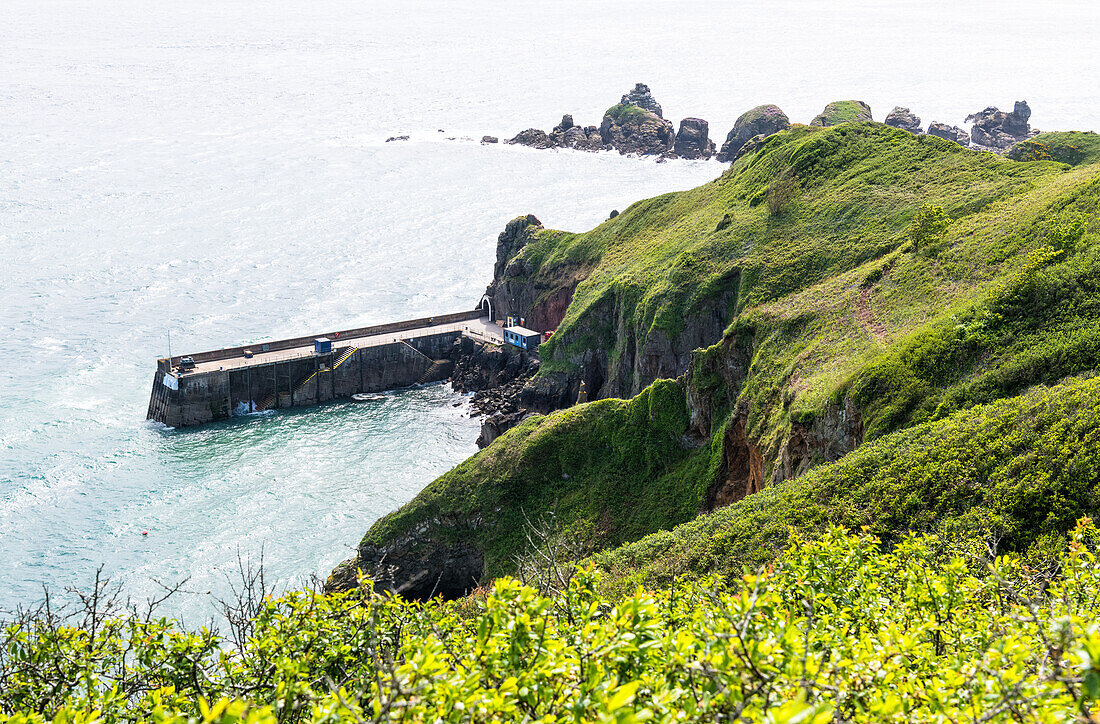 View towards Maseline Harbour, main commercial harbour on the Isle of Sark, Channel Islands, Europe