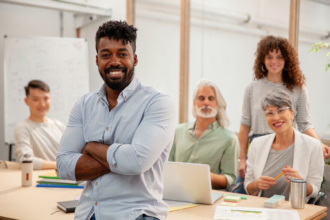 African American businessman looking at the camera with crossed arms