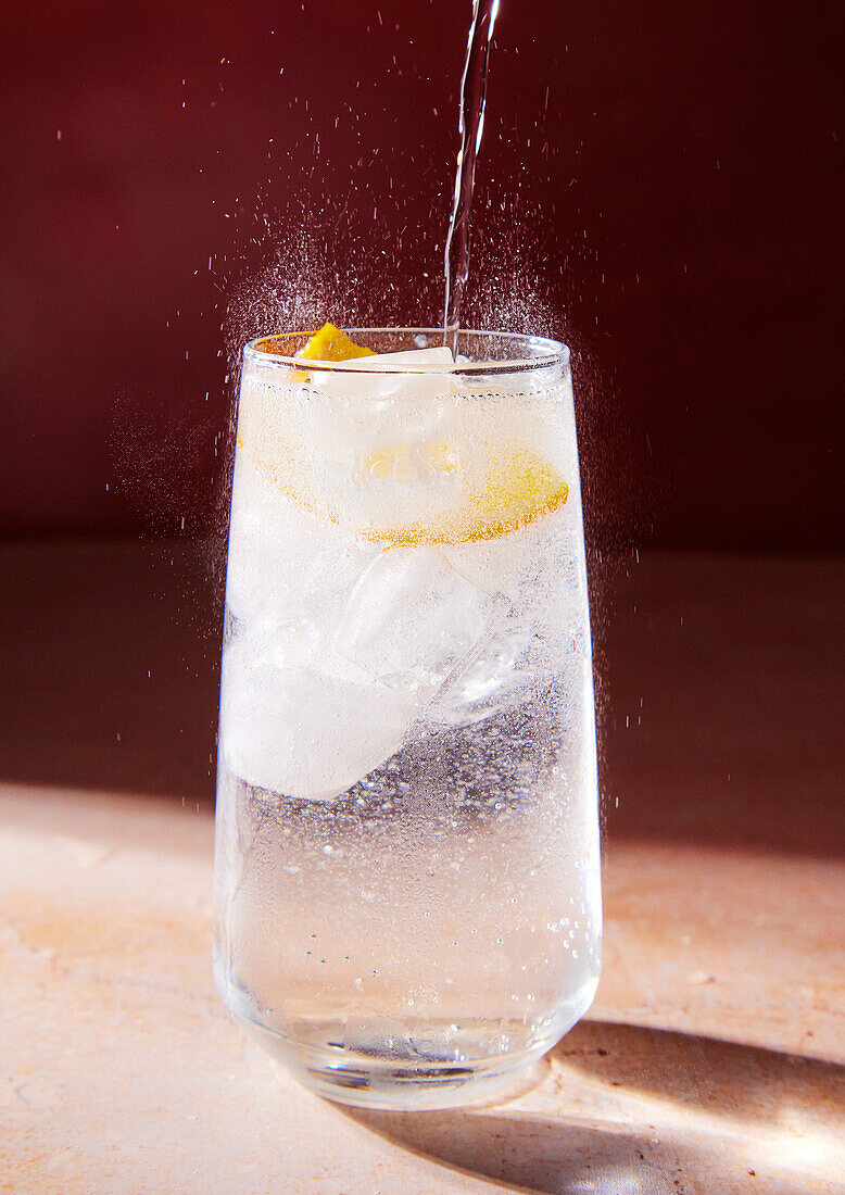 Lemonade in a glass with sparkling water