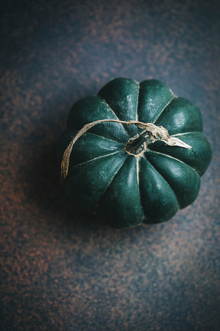 A pumpkin on a dark background