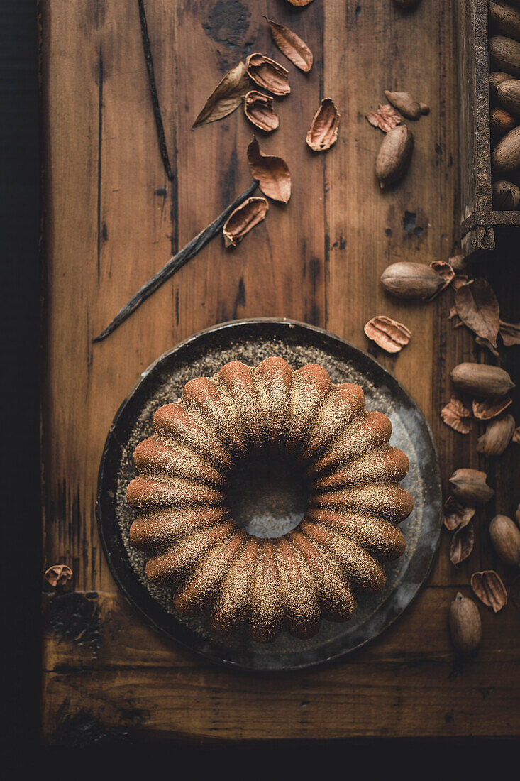 Bundt cake on a rustic wooden background