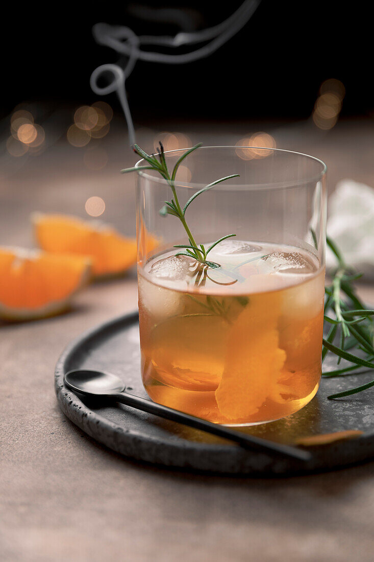 Old Fashioned Cocktail in a tumbler with bitters, whiskey and sugar
