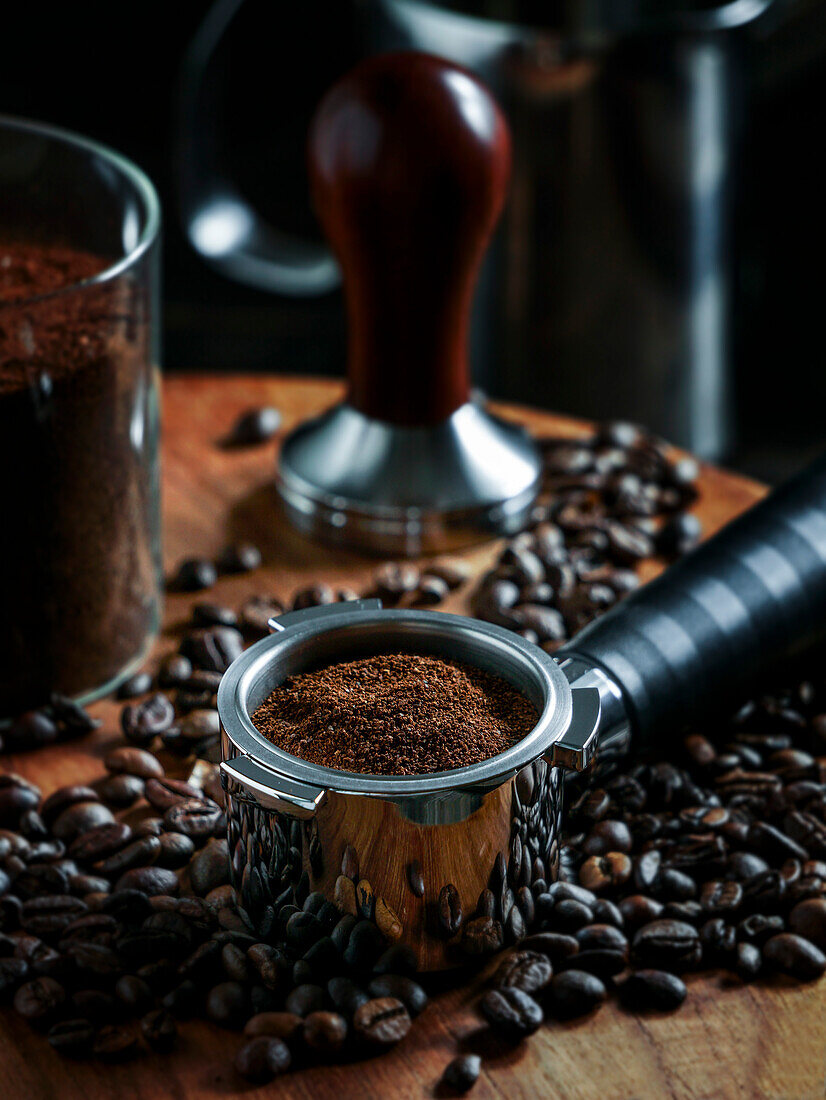 Tamper coffee and coffee press, dark background