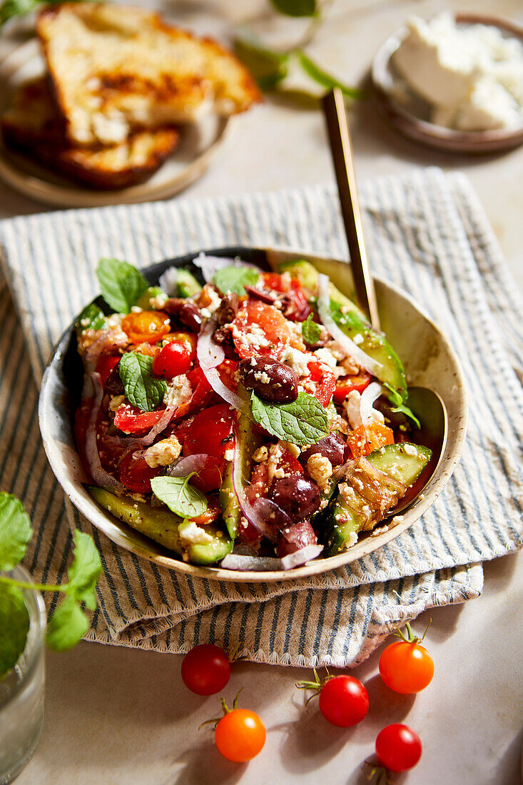 Summery Greek salad in summer light