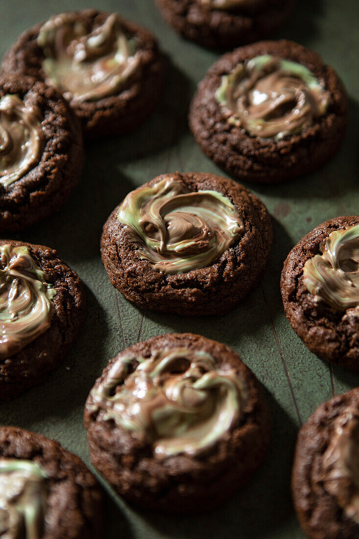 Mint chocolate biscuits on a green background