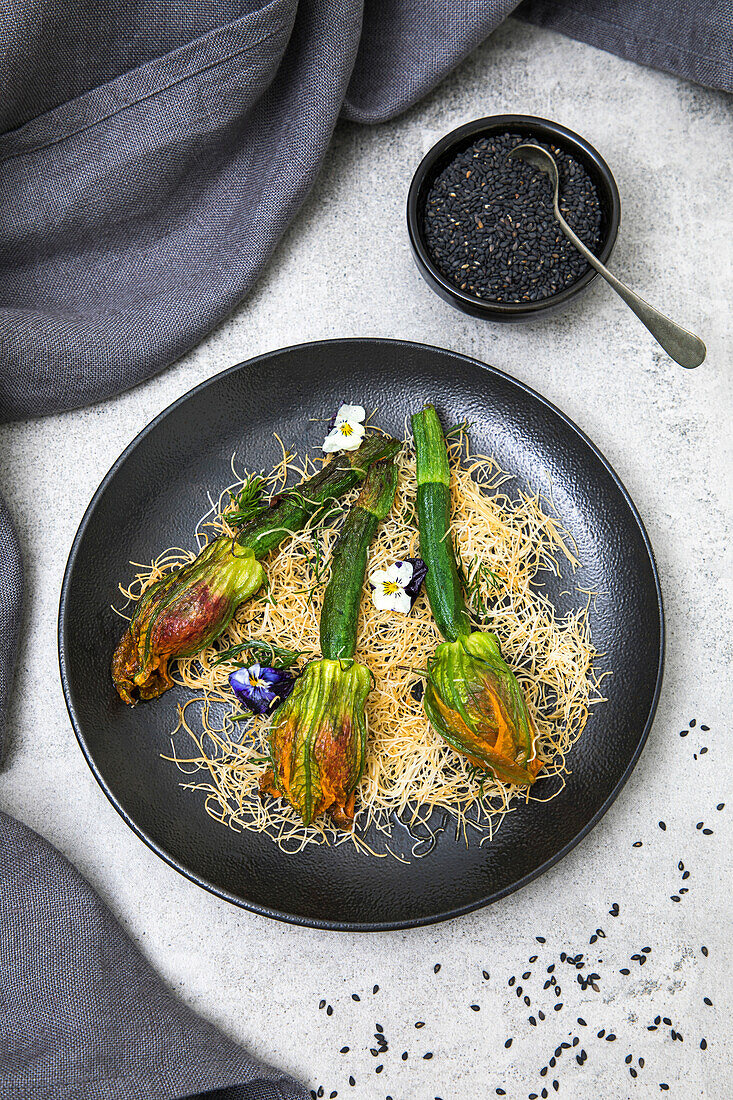 Courgette flowers Hazelnuts Ricotta Pine nuts Dried tomatoes