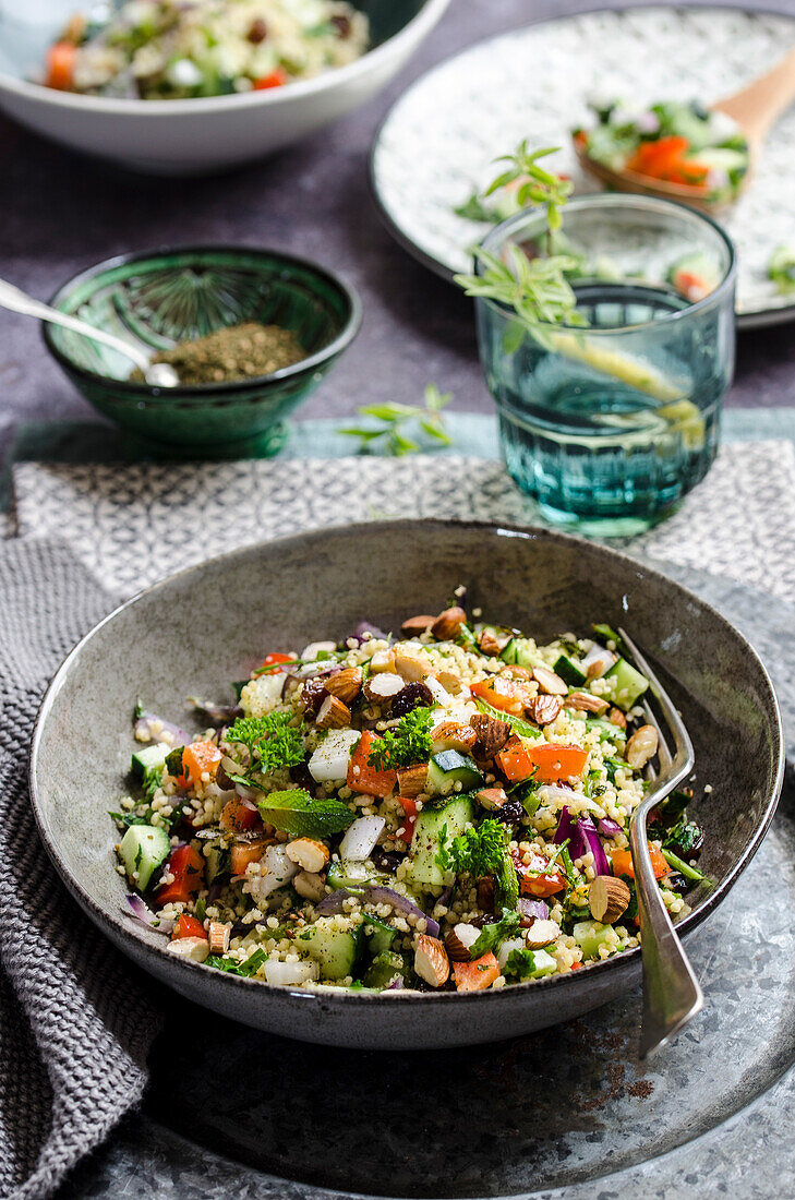 Palestinian couscous in a grey bowl