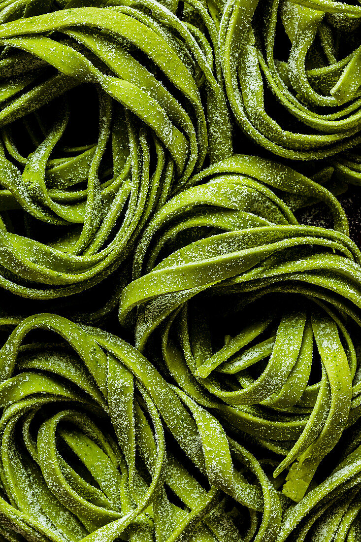 Green spinach tagliatelle pattern background