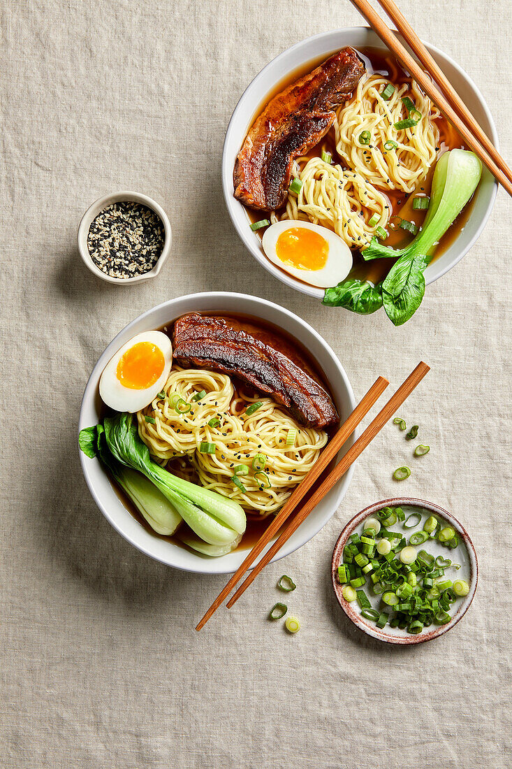Ramen, Pork Belly, Bok Choy and Egg with a Light Neutral Background