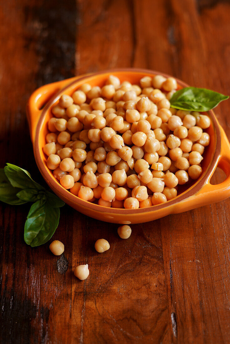 Bowl of cooked high-fibre, high-protein pulses, chickpeas, also known as garbanzo beans
